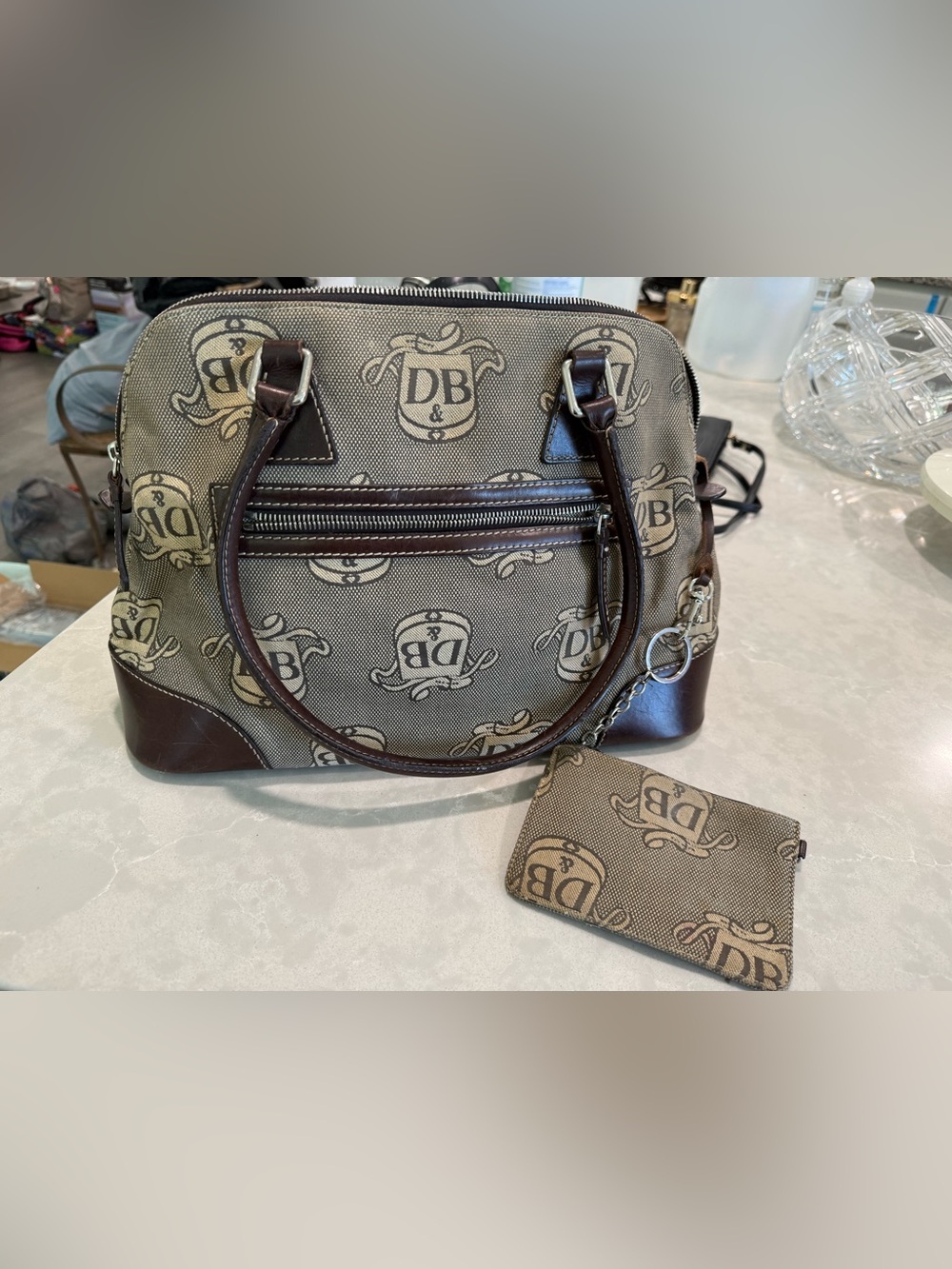 Dooney & Bourke Brown
Signature Donegal Crest Dome
Satchel, Used & Vintage